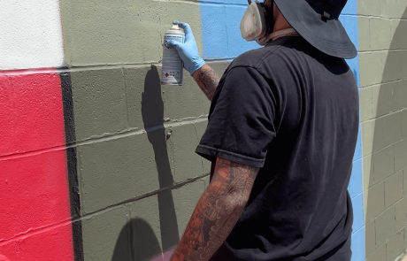 Gabe Barajas painting the Wright Angled mural at Nextdoor at Birdie’s in Valparaiso, IN