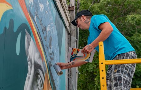 Mural artist Phillip Seth at 2025 Mural Walk in Valparaiso, IN. Photo by Alderson Photography.