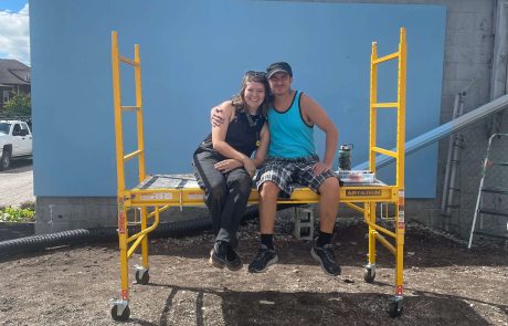 Mural artist Phillip Seth at 2025 Mural Walk in Valparaiso, IN.